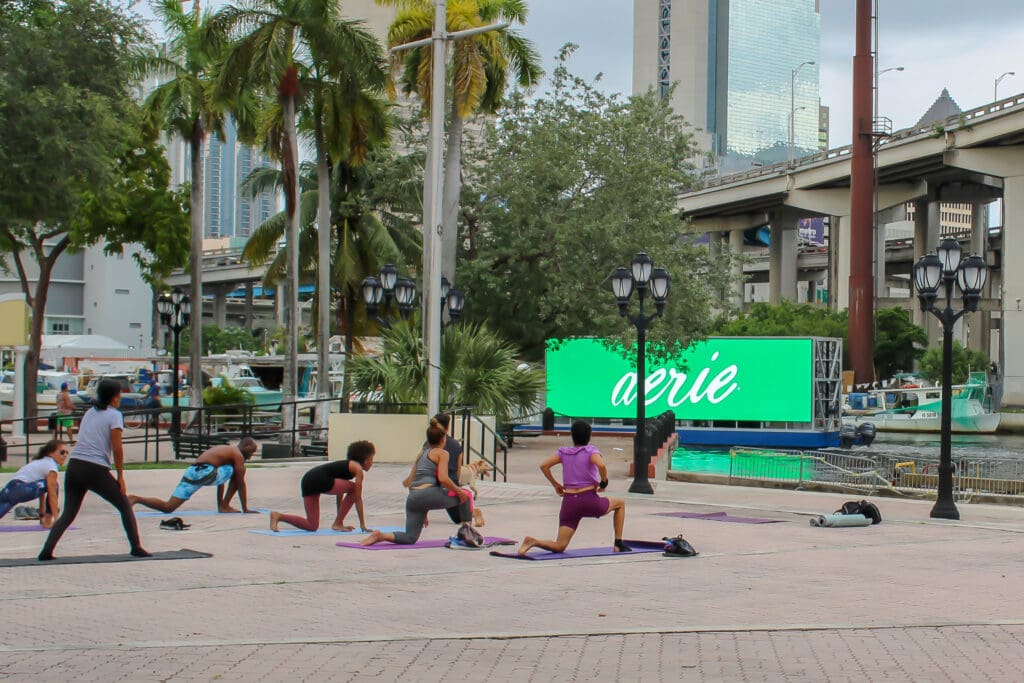 Group doing yoga in downtown Miami.