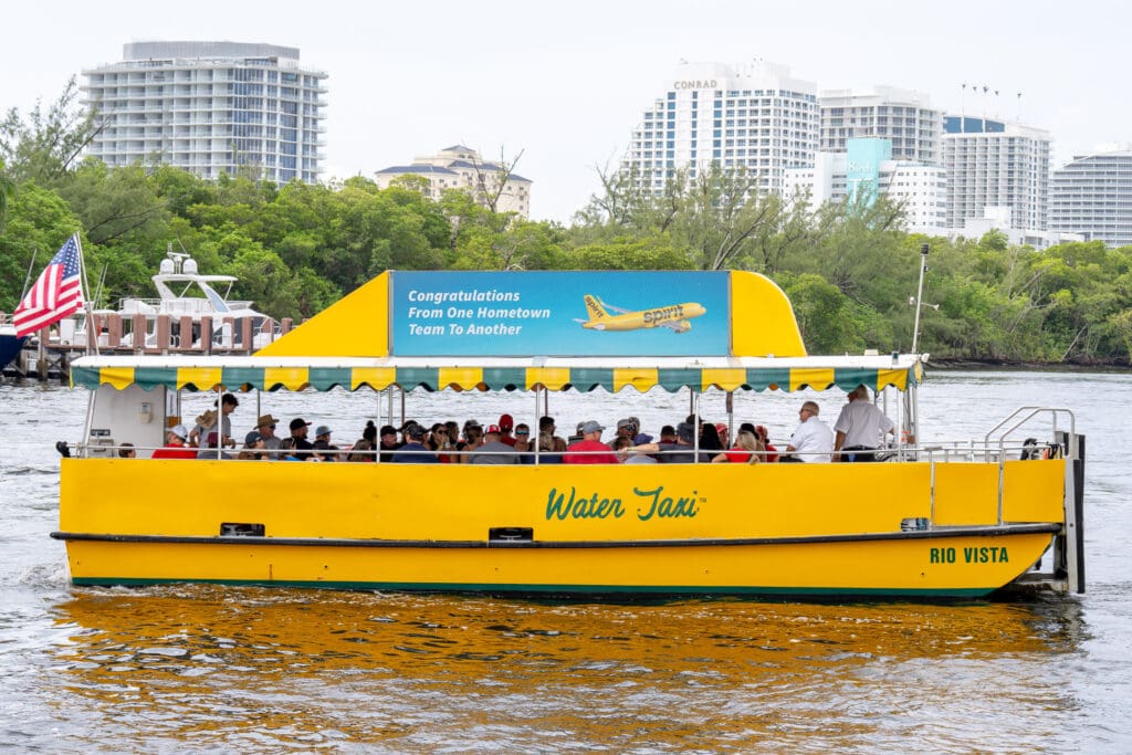 Spirit Airlines advertisement on Fort Lauderdale Water Taxi digital billboard screens