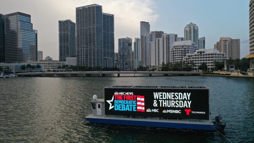 Advertising democratic debate on NBC on a floating billboard screen in Miami