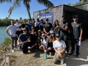 Ballyhoo Media team volunteering at Pelican Harbor Seabird Station, restoring wildlife habitats in our community.